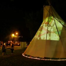 Video projection on a Tipi - work by Dana Claxton